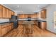 Kitchen with granite island and wooden cabinets at 1608 Irving Place, Creedmoor, NC 27522