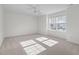 Bright bedroom with carpet and large window at 1608 Irving Place, Creedmoor, NC 27522