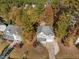 Aerial view of a two-story house with a yard at 1608 Irving Place, Creedmoor, NC 27522