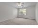 Bright bedroom with neutral colored carpet and a window at 1608 Irving Place, Creedmoor, NC 27522