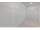 Spacious walk-in closet with wire shelving at 1608 Irving Place, Creedmoor, NC 27522