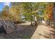 Nice backyard with wooden deck and stairs leading to the lawn at 1608 Irving Place, Creedmoor, NC 27522