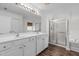 Bathroom with double vanity, shower, and garden tub at 1608 Irving Place, Creedmoor, NC 27522