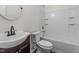 Clean bathroom with tub, toilet and vanity at 1608 Irving Place, Creedmoor, NC 27522