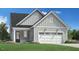 One-story house with gray siding, two-car garage, and landscaping at 520 Gainer Dr # 6, Raleigh, NC 27610