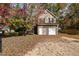 Two-story house with stone and siding exterior at 1412 Hanford Hills Rd, Graham, NC 27253