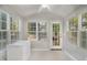 Sunroom with multiple windows and access to backyard at 1412 Hanford Hills Rd, Graham, NC 27253