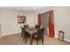 Dining room with dark wood table and chairs at 1412 Hanford Hills Rd, Graham, NC 27253