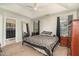Main bedroom with king-size bed and ensuite bathroom access at 1412 Hanford Hills Rd, Graham, NC 27253