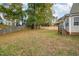 Large backyard with wooden privacy fence at 1412 Hanford Hills Rd, Graham, NC 27253