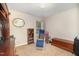 Home office featuring recliner, shelving, and storage at 1412 Hanford Hills Rd, Graham, NC 27253