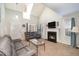 Living room with fireplace and vaulted ceiling at 1412 Hanford Hills Rd, Graham, NC 27253