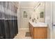 Bathroom with double vanity and shower/tub combo at 1412 Hanford Hills Rd, Graham, NC 27253