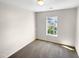 Bright bedroom with neutral walls and carpeted floor at 3122 Genlee Dr, Durham, NC 27704