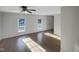 Bright living room with hardwood floors and large windows at 3181 Hardie St, Creedmoor, NC 27522
