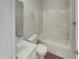 Clean bathroom with a tub, toilet, and vanity at 3181 Hardie St, Creedmoor, NC 27522