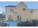 Two-story house with light beige siding, blue deck, and mature shrubs at 3181 Hardie St, Creedmoor, NC 27522