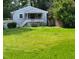 House exterior with green lawn at 327 Ranch Farm Rd, Raleigh, NC 27603