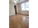 Bright bedroom featuring wood-look flooring at 327 Ranch Farm Rd, Raleigh, NC 27603