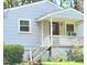 House exterior features gray siding and a porch at 327 Ranch Farm Rd, Raleigh, NC 27603