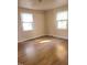 Well-lit bedroom with light wood flooring at 327 Ranch Farm Rd, Raleigh, NC 27603