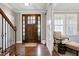 Bright entryway with a charming barn door and hardwood floors at 5356 Cypress Ln, Raleigh, NC 27609