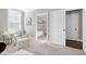 Bedroom with a sitting area and access to a full bath at 5356 Cypress Ln, Raleigh, NC 27609