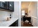 Butlers pantry with quartz countertops and glass-front cabinetry at 5356 Cypress Ln, Raleigh, NC 27609