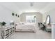 Large bedroom with a king-size bed and a sitting area at 5356 Cypress Ln, Raleigh, NC 27609