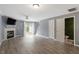 Spacious living room with fireplace and sliding glass doors at 2633 Vega Ct, Raleigh, NC 27614