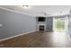 Bright living room with hardwood floors and fireplace at 2633 Vega Ct, Raleigh, NC 27614