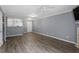 Open living room with hardwood floors and high ceilings at 2633 Vega Ct, Raleigh, NC 27614