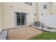 Small patio area with sliding glass door access from the townhome at 2633 Vega Ct, Raleigh, NC 27614