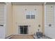 Small patio area with sliding glass door access from the townhome at 2633 Vega Ct, Raleigh, NC 27614