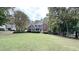 Large front yard with mature trees at 159 Trantham Trl, Clayton, NC 27527
