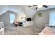 Bright bedroom with a desk, dresser, and twin bed at 159 Trantham Trl, Clayton, NC 27527