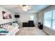 Cozy bedroom with a daybed, dresser and TV at 159 Trantham Trl, Clayton, NC 27527