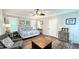 Main bedroom with king-size bed and sitting area at 159 Trantham Trl, Clayton, NC 27527