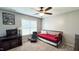 Bedroom with daybed and large window at 159 Trantham Trl, Clayton, NC 27527