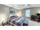 Spacious bedroom with a king-size bed and work area at 159 Trantham Trl, Clayton, NC 27527