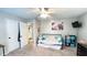 Spacious bedroom with daybed and access to bathroom at 159 Trantham Trl, Clayton, NC 27527