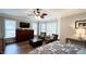 Main bedroom with sitting area and large windows at 159 Trantham Trl, Clayton, NC 27527