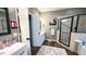 Double vanity bathroom with a walk-in shower at 159 Trantham Trl, Clayton, NC 27527