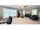 Bonus room with a treadmill and home office setup at 159 Trantham Trl, Clayton, NC 27527