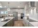 Modern kitchen with stainless steel appliances and an island at 53 Macy Cir, Wendell, NC 27591