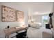 Bedroom with desk and window overlooking backyard at 53 Macy Cir, Wendell, NC 27591