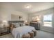 Spacious bedroom with large bed and ample natural light at 53 Macy Cir, Wendell, NC 27591
