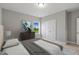 Serene bedroom with window and ample closet space at 53 Macy Cir, Wendell, NC 27591