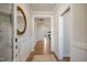 Bright and airy entryway with hardwood floors and elegant mirror at 53 Macy Cir, Wendell, NC 27591
