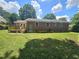 Brick ranch home with deck and spacious backyard at 805 Newcombe Rd, Raleigh, NC 27610